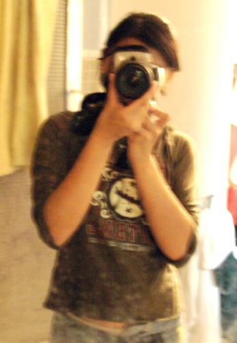 photography is what i love  - I use my sister's Canon DLSR Rebel TX or plainly Canon 300D to take some pictures. I mostly use a plain Kodak digital camera, but unfortunately my other sister lost it in her trip to Manila. So im left with borrowing my sister's camera. Its a great camera to work with. It takes such vivid clear images. But the only thing i don't like about it is that you can't carry it easily around. It's tough especially if you're a girl and your bringing a huge expensive camera around streets filled with people. You never know who or what you run into. And you might even get scammed. And well.. bye bye camera. But it's worth purchasing a camera like this. I definitely recommend to whoever would like to buy one, but i would also highly recommend Nikon ( im not biased or anything). I heard its the best because they use glass lens ( i just heard it from someone, don't know if it's true). But Nikon is still a good brand, so is Canon. If you want to purchase one i have a friend who is a Canon dealer.