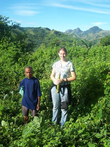 up close with an aeta elder - this is the picture when we tried to visit one of the aeta communities in the philippines, the background is their farn in which they depend on as resources