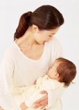 a mother with her baby - A baby is always so dear to its mother. a mother with her baby - A baby is always so dear to its mother.