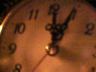 ? - Photograph of a clock, depicting time..