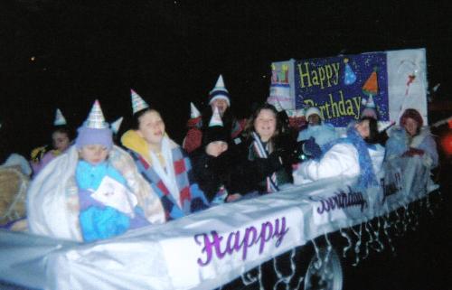 Parade float -  This is our Happy birthday float. As I said it is hard to tell what it is with so many girls and no lights.