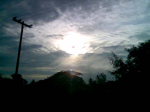 The Morning Sun - I took this shot using my phone while I was on my way to school. Ahehehe... I just liked the view..