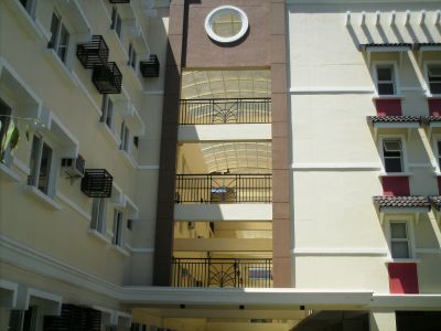 Condominium - This is where I live. Not really the whole building but we have a unit here. For now, I love living in condo. When I grow up and have my own job, I'll definitely buy a house for myself. Anyways, this condo is 4 floors high.