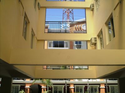 Condominium 2 - Another picture of a condominium. On the far back there, that's where our unit is located. The condominium also had a swimming pool.