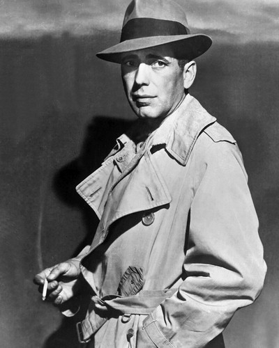 Humphrey Bogart - I think this is a screenshot from "Casablanca" thats just a guess though.