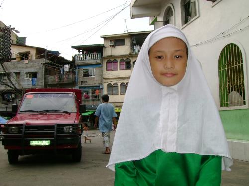 Innocence - i took this picture when i had the opportunity to go inside a muslim community, weve done service project, and tried to do some community emmersion on the said area, feeding programs, renovations and teaching this children is what we have done so far, although there are so many issues regarding religious conflicts, still you can see in their eyes the hope and innocense that only children can have.