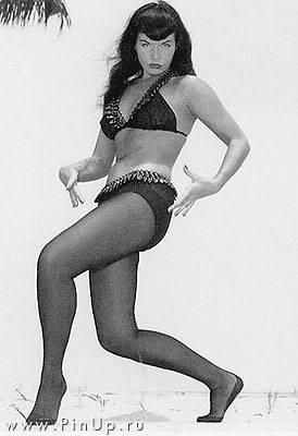 Bettie Paige - A sexy strutting Bettie Paige shot