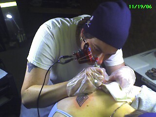 Tattooing - Me giving my best friend her first tattoo.
