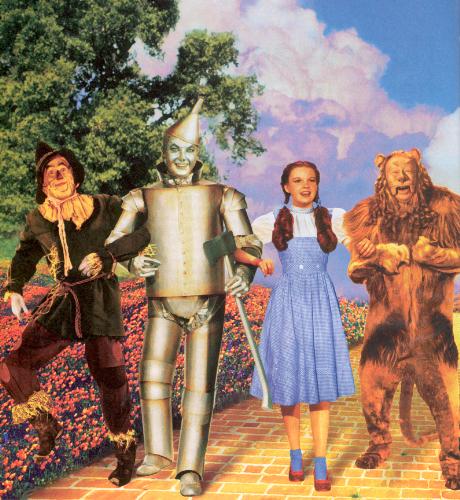 All four - Image of all four, Dorothy, Tinman, Scarecrow and Cowardly lion as they walk down the Yellow Brick Road in the Wizard of Oz