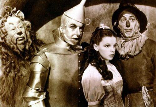 All Four - Black and white image of Dorothy, Tinman, Scarecrow, and the Cowardly lion from The Wizard of Oz
