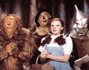 Cast - Image of Dorothy, Tinman, Scarecrow, Cowardly Lion from the movie The Wizard of Oz