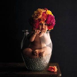 vased baby - cute baby flower in base.. very cute baby