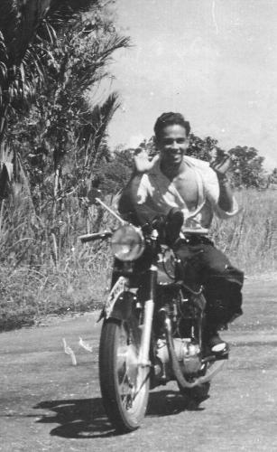 Rebel Dad - Dad on motorcyle showing off. Rebel Dad - Dad on motorcyle showing off.