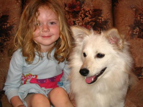 My Grandaughter with My Puppy - My 3 year old Grandaughter in her PJ's with my puppy Wiley.