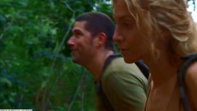 Jack and Juliette from tv&#039;s LOST - Jack and Juliette walking in the woods. Episode 16, season 3