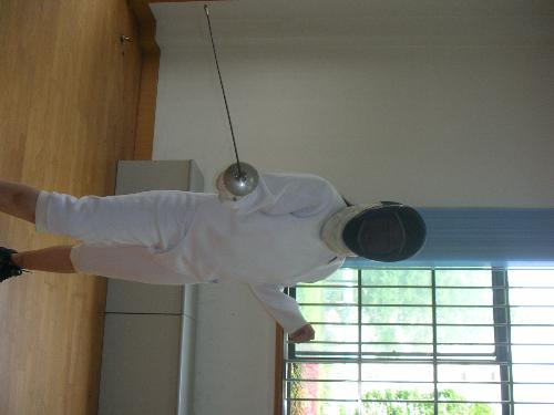 fencing - I chose fencing as my P.E course. Did a terrible job at last regardess of my pose.