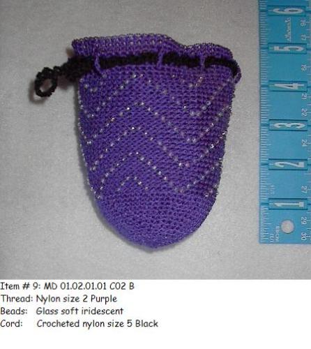 hand-crocheted pouch - This bag is a simple one, using nylon instead of cotton. The beads are worked in as you go.
I also do some with more open weave.
I&#039;d love to sell these, but have no intent on making a living out of it.