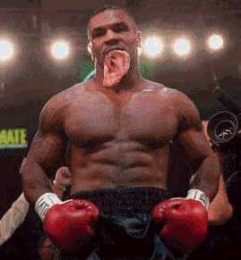 Gimme your Ear - This picture of Mike Tyson is funny, on june 28, 1997, Mike Tyson bit Evander Holyfield's ear, purpotedly in retaliation for Holyfield headbutting him. Tyson lost a point, but the fight continued. When Tyson bit Holyfield's other ear and actually it did removed a chunk of his flesh (not the whole ear as shown in the photo), he was then disqualified! Tyson would later be fined 3 million and have his boxing license revoked!! What happened to holyfield's ear?? They had to be surgically re-attached after the fight!!