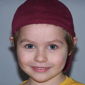 my son - Owen Patrick--my poor boy stuck in a sister sandwich. He is 15 months younger then his older sister and 13 months older then his middle sister and 4 1/2 years older then his baby sister. He adores his baby sister, Nora and will do anything for her. She so has him wrapped around her little finger. He is 5 1/2 now and is my big boy.