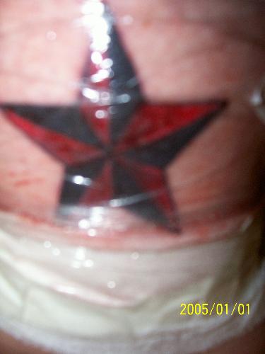 tattoo (after it was plastic'd up) - nautical star