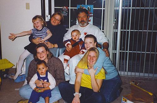 Big family pic - This is a pic of my step dad, my step sister, my sister, myself, and my kids. We make a pretty big family, and this isn't all of us.