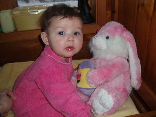 Brooklyn and Easter toy - Brooklyn can almost sit up by herself for a few minutes.