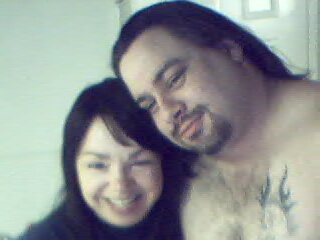 me and my hubby - This was taken with our first webcam right after we moved in together.;-)