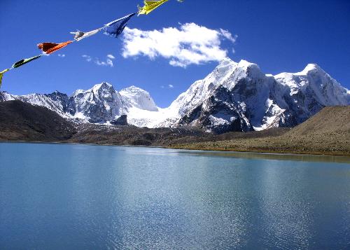 peace - Place : Gurudongmar Lake (Sikkim, India) A truly peaceful place at an altitude of 18000ft above sea level. Surrounded by mountains covered with snow the lake is breathtaking. Worshiped by Hindu's and Buddhist this lake certainly is magical.