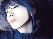 Paku-Sama - Paku Romi (or Park, it depends of where you're reading/listening to..ò_O) was born In Edogawa, Tokyo, On January 22nd 1972, and she is a Zainichi Koraen descendent. 
(Zainichi Koreans, or Zainichi for short, are the permanent ethnic Korean residents of Japan which constitute the largest ethnic minority group in Japan. The term refers only to long term, permanent residents of Japan who are not ethnic Koreans who have acquired Japanese nationality through naturalization.)
Here main job is seiyuu