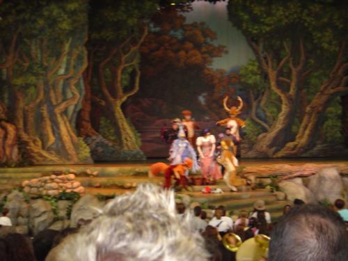 Snow White and the Seven Dwarfs - This photo displays the famous fairy tale character Snow White in the play being enacted on stage.