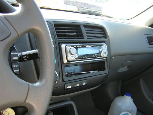 A car stereo...not mine though! - This is a stock car stereo...I can tell!