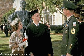 Forrest graduate - Forrest Gump graduate his high school. On the picture are he, his mother and the admiral.