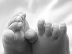 adoption - Child&#039;s feet