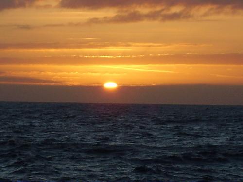 sunset at sea - a picture of the sunset taken from a ship out in the middle of the north sea