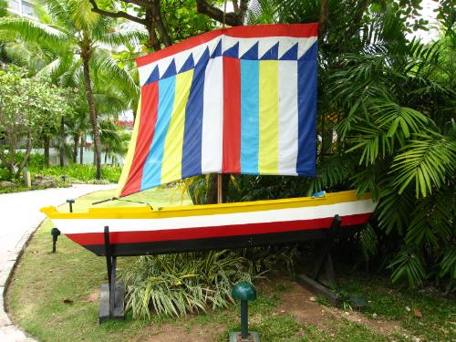 a Vinta - This vividly colored boat is popularly known as 'vinta' and you can see this most often in Zamboanga,Philippines. I took this one at Shangrila Spa and Resort.