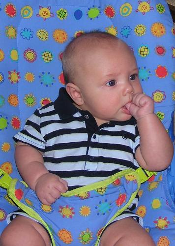 My little thumb-sucker - My son, Robert James just started sucking his thumb yesterday. I don't know if I like it or not. My husband hates it, and tries to stop him when he catches him sucking. We just don't want him to be sucking his thumb when he gets older.