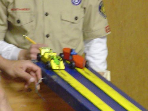 Pinewood Derby cars ready to race. - There's nothing like the excitement and fun of a Pinewood Derby.