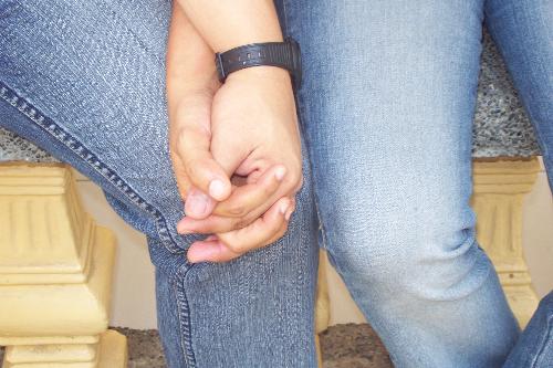 my husband and I (holding hands) - this was taken after attending an early sunday mass.