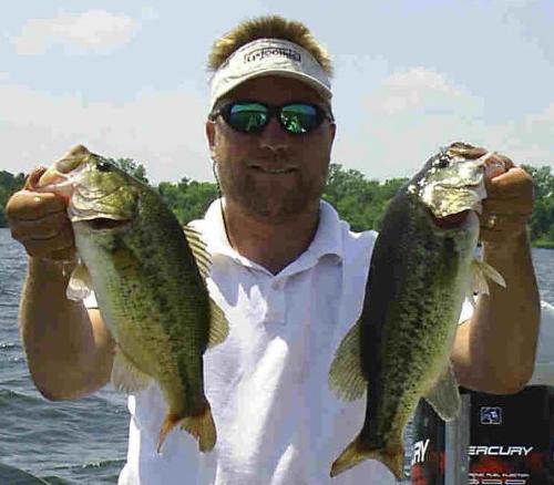 Rich with Bass - Me with two chunky largemouth bass from Lake Marion