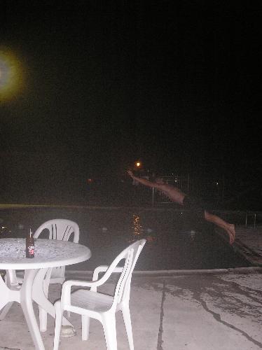 swimming - Diving into a pool.