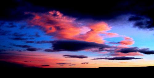 Sunset - This is just a picture of a sunset against the clouds. No alterations.