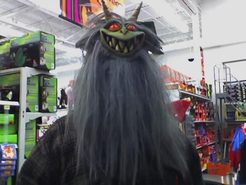 trying out  - this is my bf trying on a mask from walmart funny funny