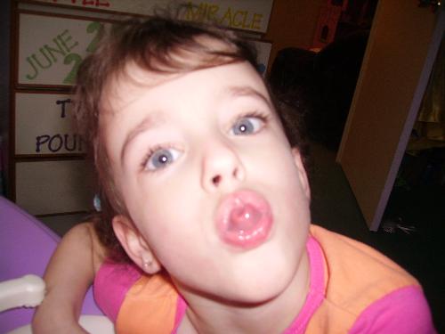 funny faces - my daughter finnaly learned how to roll her tongue