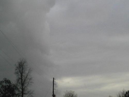 staring at clouds -  This is a picture of a cloud that looked like a tornado forming.