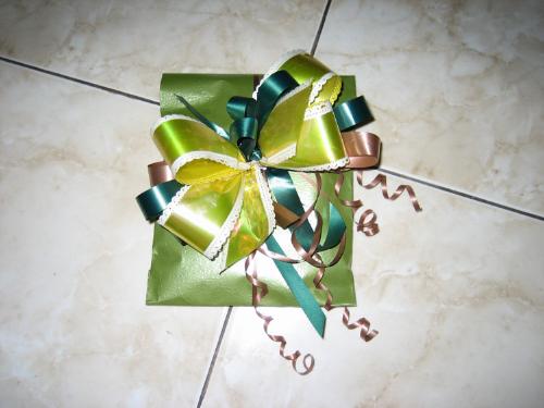 A Gift - I like gift wrapping. Sometimes I found that my wrap is more expensive than the gift itself. I have this dream to opn a gift wrap shop. But I think it's quite impossible in my country because I don't think value it. Gift wrap should come for free.