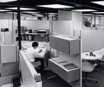 worker in office cubicle - alone working in the office