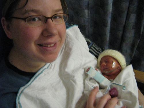 Me and my daughter - Brooke and I when she is 2 days old. She weighed 2 lbs 12 oz when she was born. She is my little miracle! She is now 4.5 months old and 11 pounds!