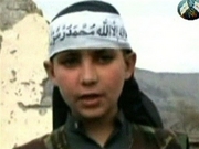 12 Year Old Killer - This a picture of the 12 year old boy seen in the video beheading an accused American spy.