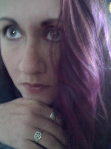 My purple hair - I am thinking of changing my avatar to this photo...but I am not sure if it is the personality that I am going for. But it does show my purple hair well. :)