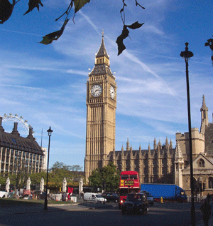 London, with Big Ben and red bus - Another must see of a visit to London. Big Ben the time keeping clock tower. London, with Big Ben and red bus - Another must see of a visit to London. Big Ben the time keeping clock tower.